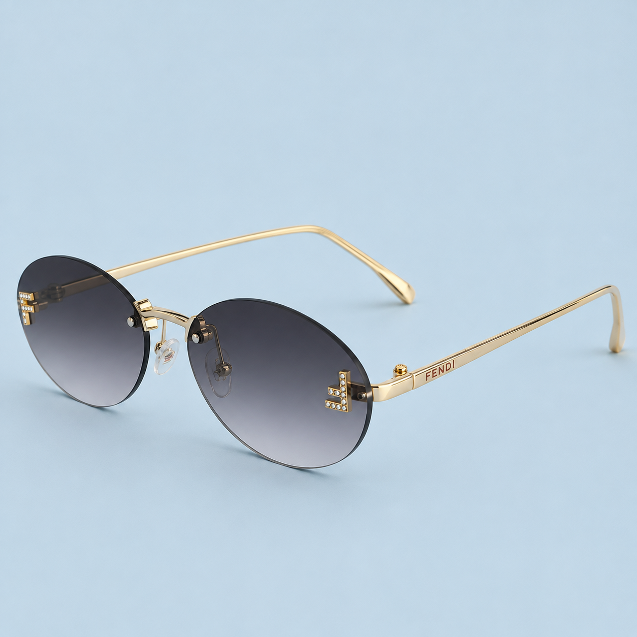FENDI — Monture Ovale Sans Cerclage, Métal Doré