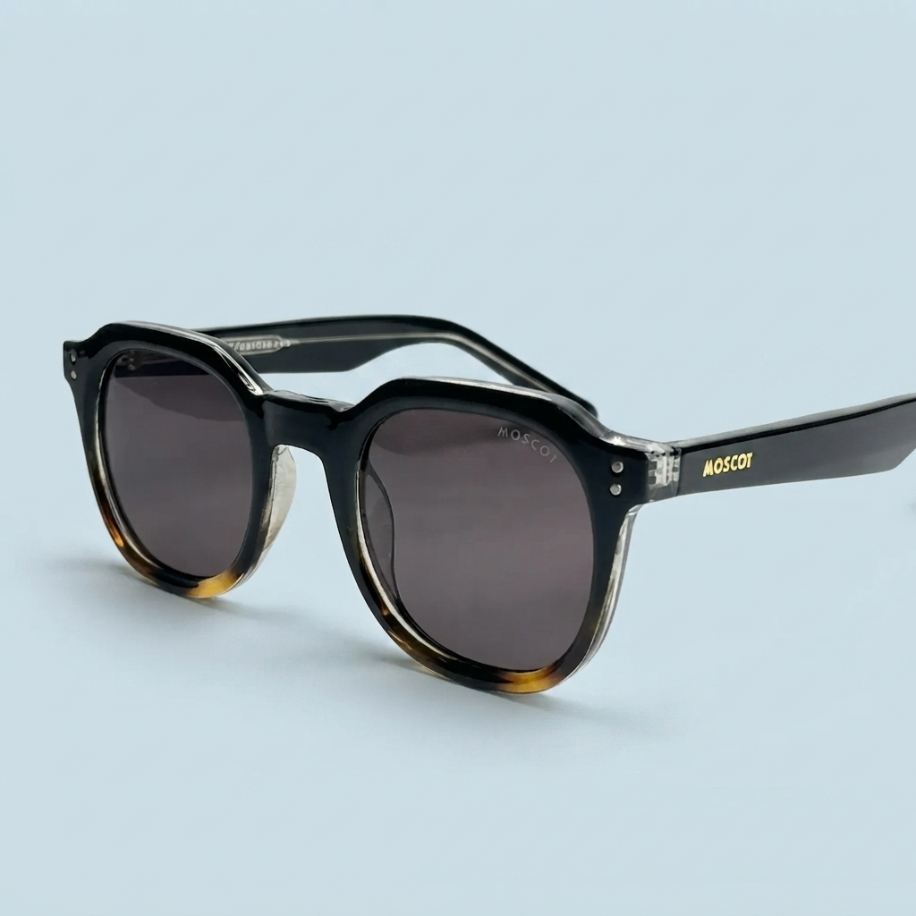 MOSCOT — Monture Ronde Noire Dégradée Tigrée, Verres Noirs