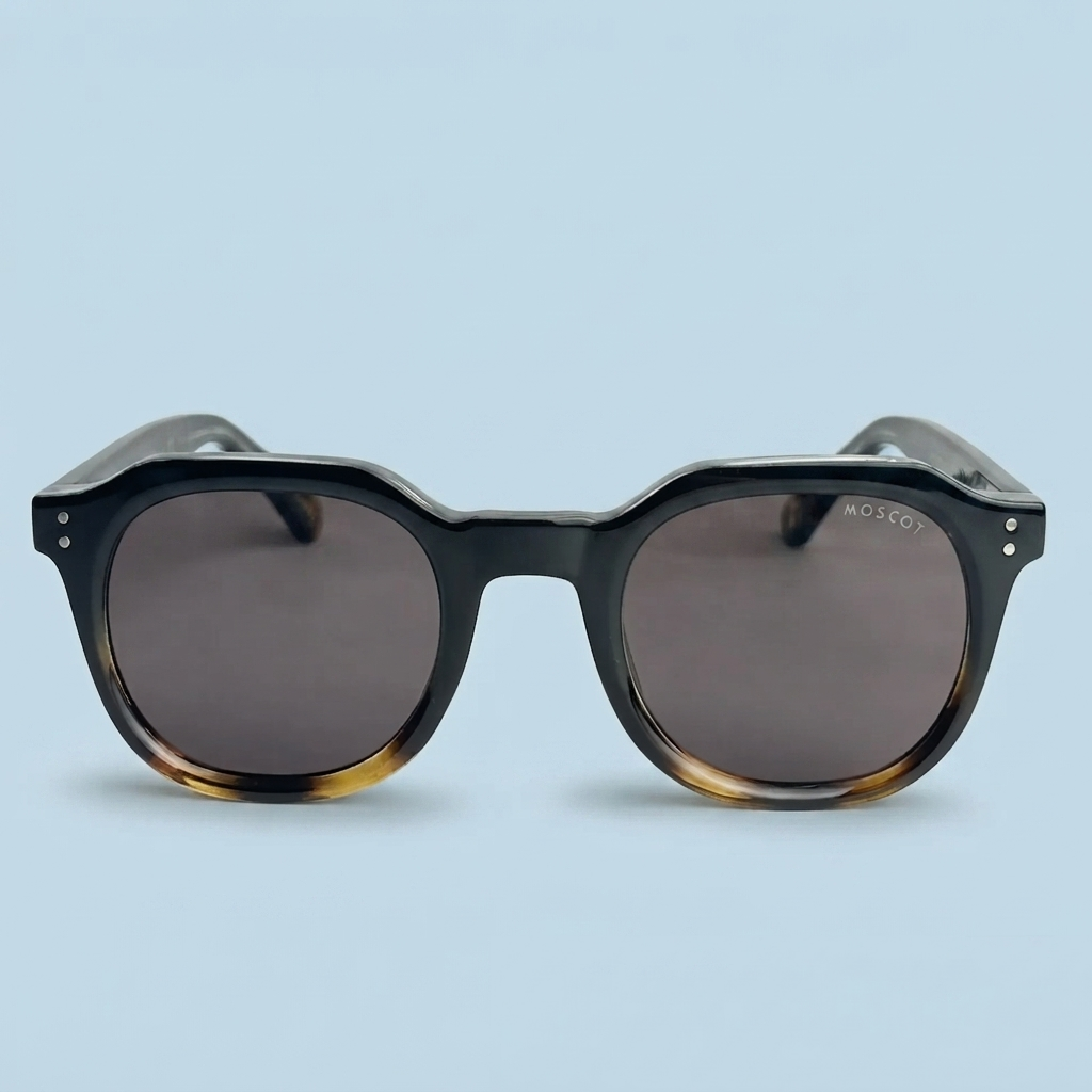 MOSCOT — Monture Ronde Noire Dégradée Tigrée, Verres Noirs