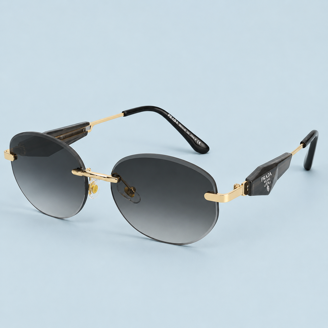 PRADA — Monture Ronde Sans Cerclage, Verres Gris Dégradé
