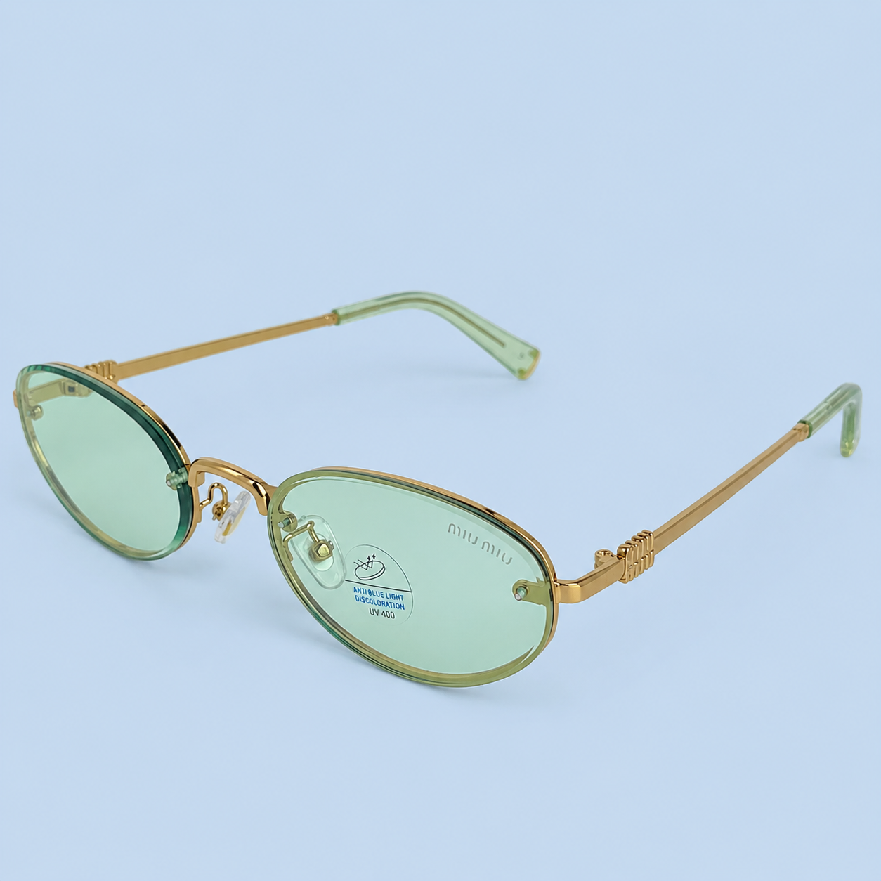 MIU MIU — Monture Ovale Sans Cerclage, Verres Verts