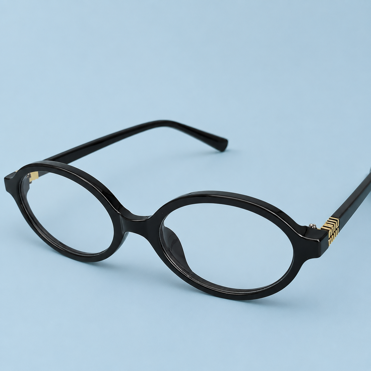 MIU MIU — Monture Optique Ronde Noire, Détails Dorés