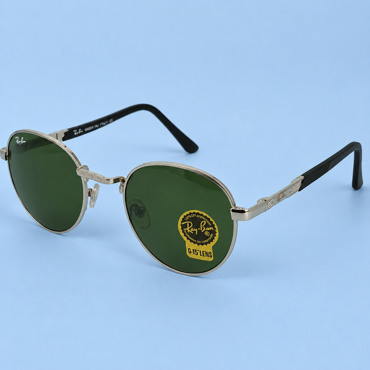 RAY-BAN — Monture Ronde Argentée, Verres Verts G-15