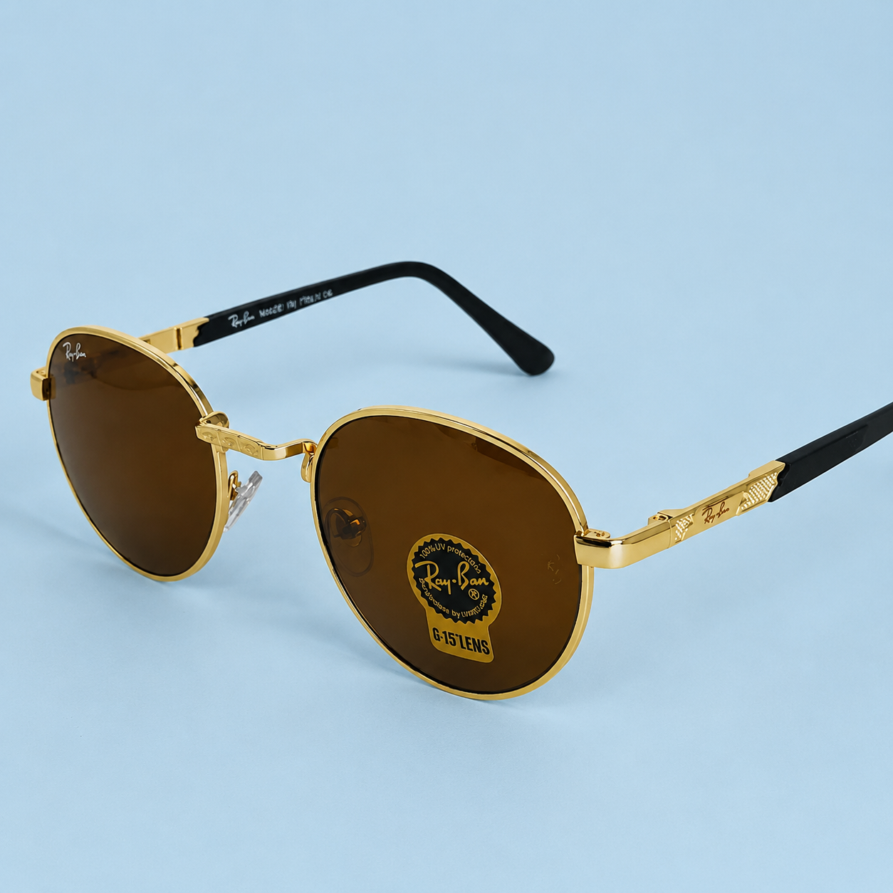 RAY-BAN — Monture Ronde Métal Doré, Verres Marron G-15